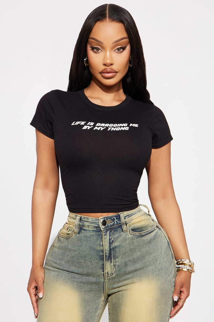 Life Is Dragging Me By My Thong Baby Tee - Black